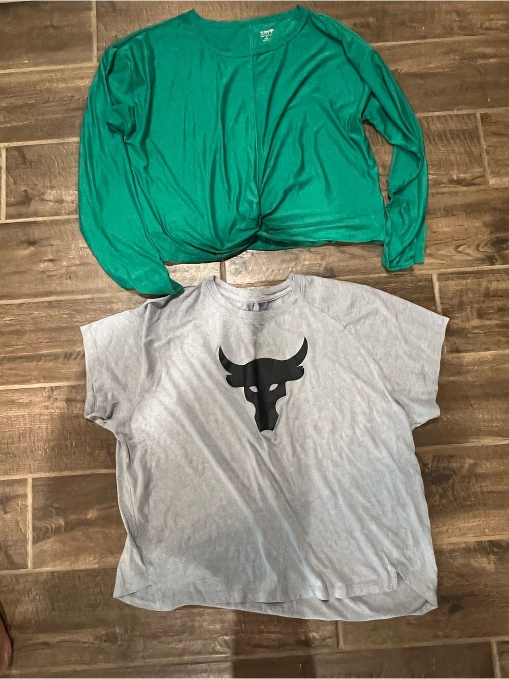 Green Long-Sleeve Twist Front Top and Grey Under Armour Rock Shirt.